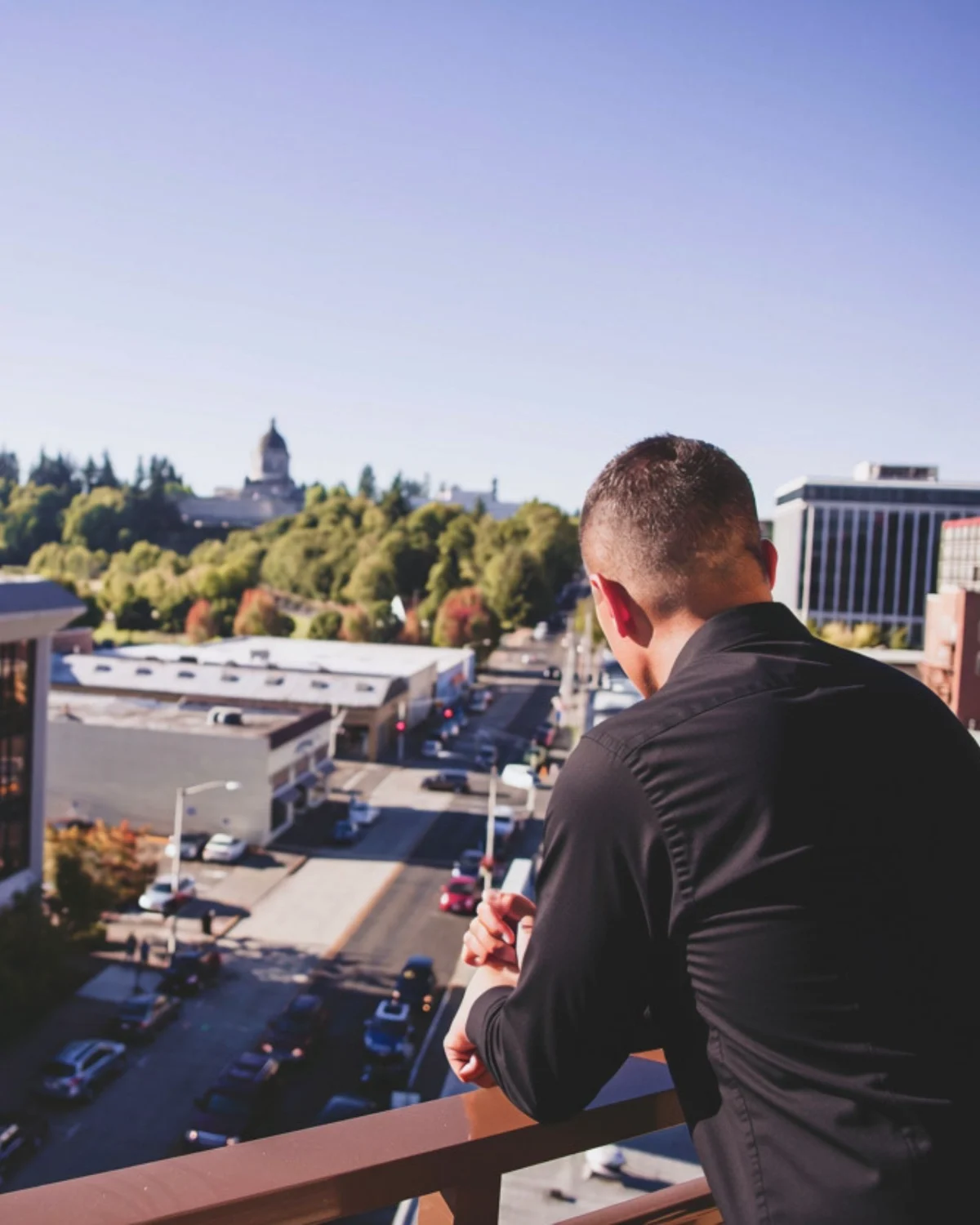 Zach Kosturos looking out over the city